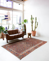 Vintage kilim rug in living room setting, bright colors, wild shaman, soft rug, bold color, Portland, Oregon, rug store, rug shop, local shop, vintage rug, modern kilim, warm colors