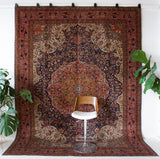 Vintage Turkish rug in a living room setting, pile rug, Turkish rug, vintage rug, portland, rug shop, bright colors, wild shaman, soft rug, bold color, Portland, Oregon, rug store, rug shop, local shop, antique rug