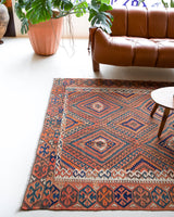 Vintage kilim rug in living room setting, bright colors, wild shaman, soft rug, bold color, Portland, Oregon, rug store, rug shop, local shop, vintage rug, modern kilim, warm colors