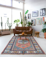 Vintage Turkish rug in a living room setting, pile rug, Turkish rug, vintage rug, portland, rug shop, bright colors, wild shaman, soft rug, bold color, Portland, Oregon, rug store, rug shop, local shop, antique rug