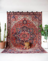 Vintage Persian rug in a living room setting, pile rug, Turkish rug, vintage rug, portland, rug shop, bright colors, wild shaman, soft rug, bold color, Portland, Oregon, rug store, rug shop, local shop, soft rug, pastel colors, faded colors, Persian rug, antique rug