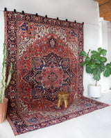 Vintage Persian rug in a living room setting, pile rug, Turkish rug, vintage rug, portland, rug shop, bright colors, wild shaman, soft rug, bold color, Portland, Oregon, rug store, rug shop, local shop, soft rug, pastel colors, faded colors, Persian rug, antique rug