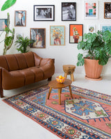 Vintage Turkish rug in a living room setting, pile rug, Turkish rug, vintage rug, portland, rug shop, bright colors, wild shaman, soft rug, bold color, Portland, Oregon, rug store, rug shop, local shop, antique rug
