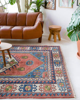 Vintage Turkish rug in a living room setting, pile rug, Turkish rug, vintage rug, portland, rug shop, bright colors, wild shaman, soft rug, bold color, Portland, Oregon, rug store, rug shop, local shop, antique rug