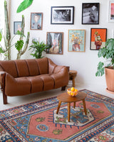 Vintage Turkish rug in a living room setting, pile rug, Turkish rug, vintage rug, portland, rug shop, bright colors, wild shaman, soft rug, bold color, Portland, Oregon, rug store, rug shop, local shop, antique rug