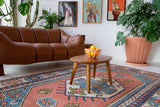 Vintage Turkish rug in a living room setting, pile rug, Turkish rug, vintage rug, portland, rug shop, bright colors, wild shaman, soft rug, bold color, Portland, Oregon, rug store, rug shop, local shop, antique rug