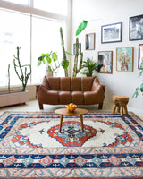 Vintage Turkish rug in a living room setting, pile rug, Turkish rug, vintage rug, portland, rug shop, bright colors, wild shaman, soft rug, bold color, Portland, Oregon, rug store, rug shop, local shop, antique rug