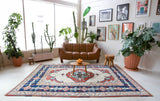 Vintage Turkish rug in a living room setting, pile rug, Turkish rug, vintage rug, portland, rug shop, bright colors, wild shaman, soft rug, bold color, Portland, Oregon, rug store, rug shop, local shop, antique rug