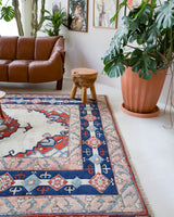 Vintage Turkish rug in a living room setting, pile rug, Turkish rug, vintage rug, portland, rug shop, bright colors, wild shaman, soft rug, bold color, Portland, Oregon, rug store, rug shop, local shop, antique rug