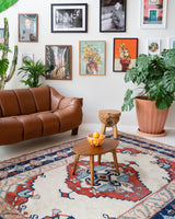 Vintage Turkish rug in a living room setting, pile rug, Turkish rug, vintage rug, portland, rug shop, bright colors, wild shaman, soft rug, bold color, Portland, Oregon, rug store, rug shop, local shop, antique rug