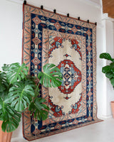 Vintage Turkish rug in a living room setting, pile rug, Turkish rug, vintage rug, portland, rug shop, bright colors, wild shaman, soft rug, bold color, Portland, Oregon, rug store, rug shop, local shop, antique rug