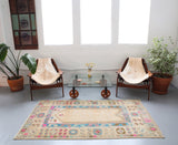 old rug, antique rug, earthy colors, faded colors, Turkish rug, vintage rug, flat weave, kilim rug, large area rug, square rug, Wild Shaman, Portland, Oregon, rug store, rug shop, local shop