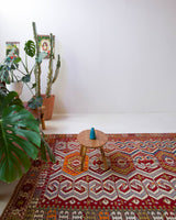 Vintage kilim rug in room decor setting, old rug, antique rug, pastel colors, faded colors, Turkish rug, vintage rug, soft rug, Portland, Oregon, rug store, rug shop, local shop, bold colors, bright colors, faded colors, antique kilim