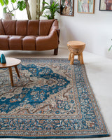 Vintage Turkish rug in a living room setting, pile rug, Turkish rug, vintage rug, portland, rug shop, bright colors, wild shaman, soft rug, bold color, Portland, Oregon, rug store, rug shop, local shop, antique rug