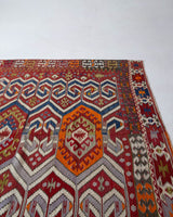 Vintage kilim rug in room decor setting, old rug, antique rug, pastel colors, faded colors, Turkish rug, vintage rug, soft rug, Portland, Oregon, rug store, rug shop, local shop, bold colors, bright colors, faded colors, antique kilim