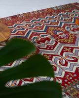 Vintage kilim rug in room decor setting, old rug, antique rug, pastel colors, faded colors, Turkish rug, vintage rug, soft rug, Portland, Oregon, rug store, rug shop, local shop, bold colors, bright colors, faded colors, antique kilim