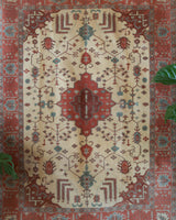 Vintage Turkish rug in living room setting, old rug, antique rug, pastel colors, faded colors, Turkish rug, vintage rug, soft rug, Portland, Oregon, rug store, rug shop, local shop