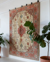 Vintage Turkish rug in living room setting, old rug, antique rug, pastel colors, faded colors, Turkish rug, vintage rug, soft rug, Portland, Oregon, rug store, rug shop, local shop