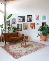Vintage Turkish rug in living room setting, old rug, antique rug, pastel colors, faded colors, Turkish rug, vintage rug, soft rug, Portland, Oregon, rug store, rug shop, local shop