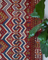 Vintage kilim rug in room decor setting, old rug, antique rug, pastel colors, faded colors, Turkish rug, vintage rug, soft rug, Portland, Oregon, rug store, rug shop, local shop, bold colors, bright colors, faded colors, antique kilim