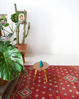 Vintage kilim rug in room decor setting, old rug, antique rug, pastel colors, faded colors, Turkish rug, vintage rug, soft rug, Portland, Oregon, rug store, rug shop, local shop, bold colors, bright colors, faded colors