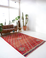 Vintage kilim rug in room decor setting, old rug, antique rug, pastel colors, faded colors, Turkish rug, vintage rug, soft rug, Portland, Oregon, rug store, rug shop, local shop, bold colors, bright colors, faded colors