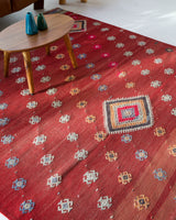 Vintage kilim rug in room decor setting, old rug, antique rug, pastel colors, faded colors, Turkish rug, vintage rug, soft rug, Portland, Oregon, rug store, rug shop, local shop, bold colors, bright colors, faded colors