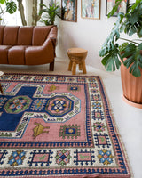 Vintage Turkish rug in a living room setting, pile rug, Turkish rug, vintage rug, portland, rug shop, bright colors, wild shaman, soft rug, bold color, Portland, Oregon, rug store, rug shop, local shop