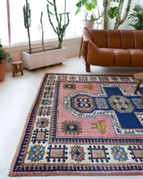 Vintage Turkish rug in a living room setting, pile rug, Turkish rug, vintage rug, portland, rug shop, bright colors, wild shaman, soft rug, bold color, Portland, Oregon, rug store, rug shop, local shop