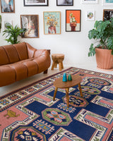 Vintage Turkish rug in a living room setting, pile rug, Turkish rug, vintage rug, portland, rug shop, bright colors, wild shaman, soft rug, bold color, Portland, Oregon, rug store, rug shop, local shop