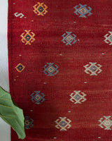 Vintage kilim rug in room decor setting, old rug, antique rug, pastel colors, faded colors, Turkish rug, vintage rug, soft rug, Portland, Oregon, rug store, rug shop, local shop, bold colors, bright colors, faded colors