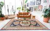 Vintage Turkish rug in a living room setting, pile rug, Turkish rug, vintage rug, portland, rug shop, bright colors, wild shaman, soft rug, bold color, Portland, Oregon, rug store, rug shop, local shop