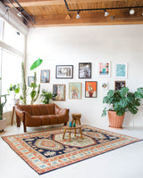 Vintage Turkish rug in a living room setting, pile rug, Turkish rug, vintage rug, portland, rug shop, bright colors, wild shaman, soft rug, bold color, Portland, Oregon, rug store, rug shop, local shop