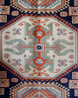 Vintage Turkish rug in a living room setting, pile rug, Turkish rug, vintage rug, portland, rug shop, bright colors, wild shaman, soft rug, bold color, Portland, Oregon, rug store, rug shop, local shop