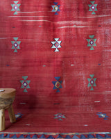 Vintage kilim rug in room decor setting, old rug, antique rug, pastel colors, faded colors, Turkish rug, vintage rug, soft rug, Portland, Oregon, rug store, rug shop, local shop, bold colors, bright colors, faded colors