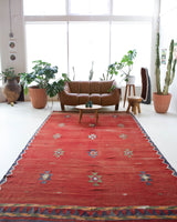 Vintage kilim rug in room decor setting, old rug, antique rug, pastel colors, faded colors, Turkish rug, vintage rug, soft rug, Portland, Oregon, rug store, rug shop, local shop, bold colors, bright colors, faded colors