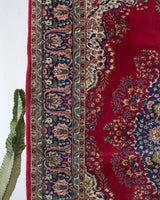 Vintage Turkish rug in a living room setting, pile rug, Turkish rug, vintage rug, portland, rug shop, bright colors, wild shaman, soft rug, bold color, Portland, Oregon, rug store, rug shop, local shop, antique rug,  carpet, ottoman design, floral carpet, traditional carpet, oriental rug