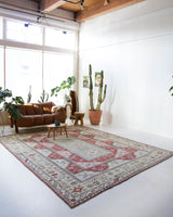 Vintage Turkish rug in living room setting, old rug, antique rug, pastel colors, faded colors, Turkish rug, vintage rug, soft rug, Portland, Oregon, rug store, rug shop, local shop