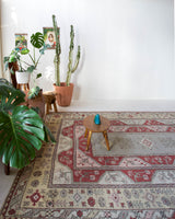 Vintage Turkish rug in living room setting, old rug, antique rug, pastel colors, faded colors, Turkish rug, vintage rug, soft rug, Portland, Oregon, rug store, rug shop, local shop