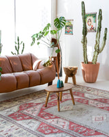 Vintage Turkish rug in living room setting, old rug, antique rug, pastel colors, faded colors, Turkish rug, vintage rug, soft rug, Portland, Oregon, rug store, rug shop, local shop