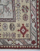 Vintage Turkish rug in living room setting, old rug, antique rug, pastel colors, faded colors, Turkish rug, vintage rug, soft rug, Portland, Oregon, rug store, rug shop, local shop