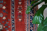 Vintage Turkish rug in a living room setting, pile rug, Turkish rug, vintage rug, portland, rug shop, bright colors, wild shaman, soft rug, bold color, Portland, Oregon, rug store, rug shop, local shop, antique rug