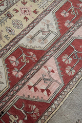 Vintage Turkish rug in living room setting, old rug, antique rug, pastel colors, faded colors, Turkish rug, vintage rug, soft rug, Portland, Oregon, rug store, rug shop, local shop