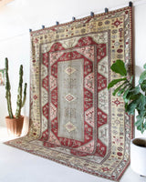 Vintage Turkish rug in living room setting, old rug, antique rug, pastel colors, faded colors, Turkish rug, vintage rug, soft rug, Portland, Oregon, rug store, rug shop, local shop