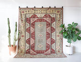 Vintage Turkish rug in living room setting, old rug, antique rug, pastel colors, faded colors, Turkish rug, vintage rug, soft rug, Portland, Oregon, rug store, rug shop, local shop