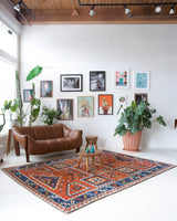 Vintage Turkish rug in a living room setting, pile rug, Turkish rug, vintage rug, portland, rug shop, bright colors, wild shaman, soft rug, bold color, Portland, Oregon, rug store, rug shop, local shop, antique rug