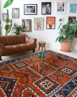 Vintage Turkish rug in a living room setting, pile rug, Turkish rug, vintage rug, portland, rug shop, bright colors, wild shaman, soft rug, bold color, Portland, Oregon, rug store, rug shop, local shop, antique rug