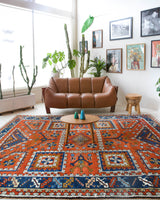 Vintage Turkish rug in a living room setting, pile rug, Turkish rug, vintage rug, portland, rug shop, bright colors, wild shaman, soft rug, bold color, Portland, Oregon, rug store, rug shop, local shop, antique rug