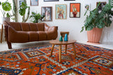 Vintage Turkish rug in a living room setting, pile rug, Turkish rug, vintage rug, portland, rug shop, bright colors, wild shaman, soft rug, bold color, Portland, Oregon, rug store, rug shop, local shop, antique rug