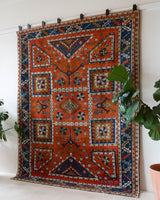Vintage Turkish rug in a living room setting, pile rug, Turkish rug, vintage rug, portland, rug shop, bright colors, wild shaman, soft rug, bold color, Portland, Oregon, rug store, rug shop, local shop, antique rug
